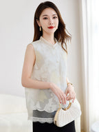 Full-body shot of a model wearing a white silk New Chinese style vest with a lace-trimmed hem and pearl buttons, holding a handbag.