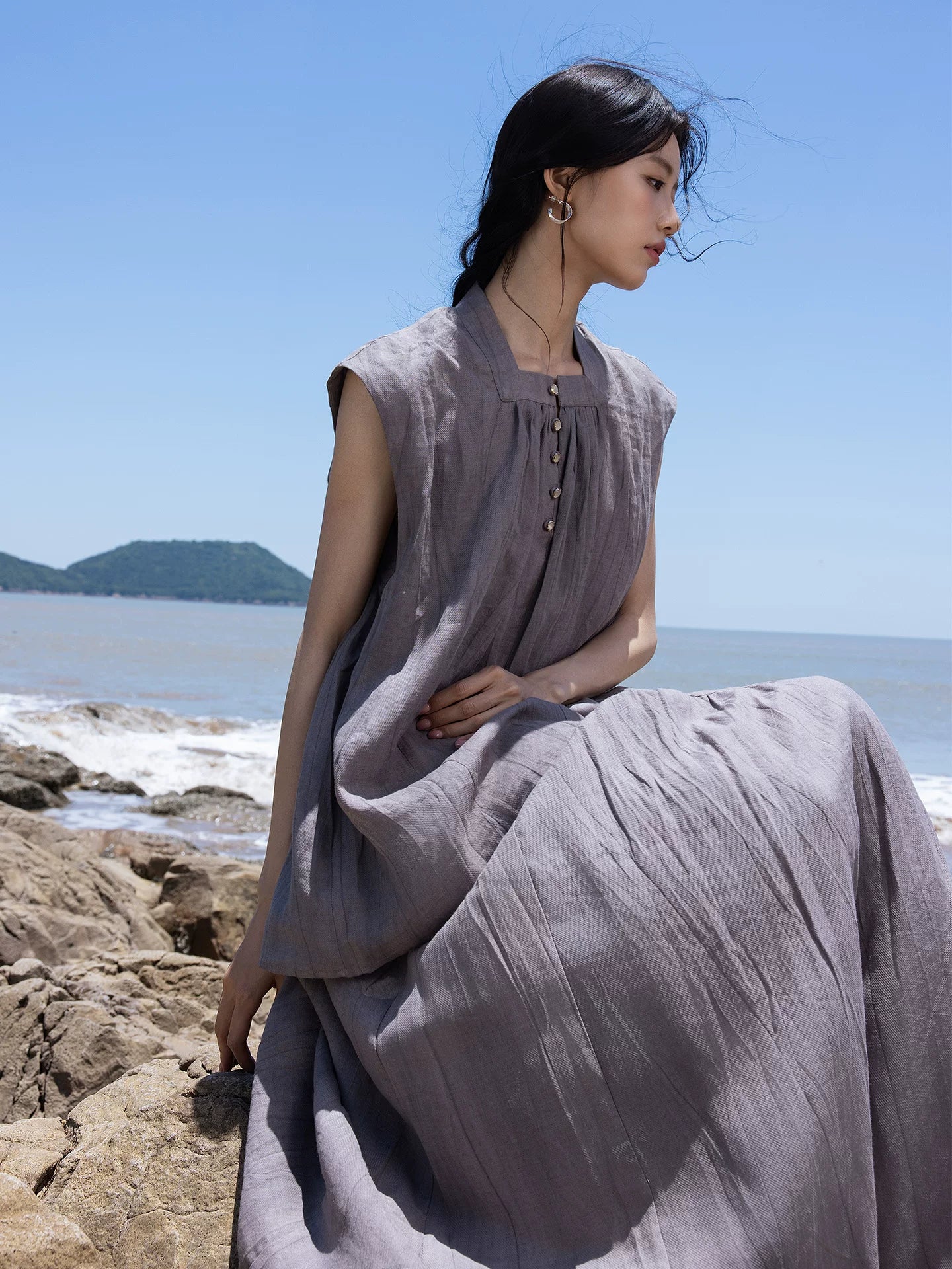 Seated view showing the drape and texture of a ramie lyocell two-piece summer set.