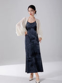 Women's minimalist slip maxi dress styled separately.