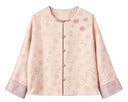 Front view of the jacket showing violet buttons, small animal motifs and lilac cuffs