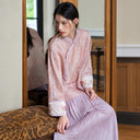 Model wearing the smoky pink long-sleeve inner top with a lilac skirt.