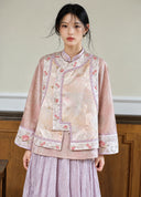 Model wearing the pink-gold vest over a smoky pink top with a lilac skirt.