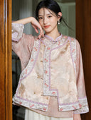 Model wearing the embroidered pink-gold jacquard vest over a smoky pink long-sleeve top.