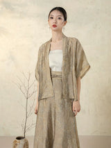 Model wearing the Stone Beige Open Front Jacket by Gambiered Silk.