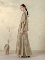 Side profile of the Stone Beige Open Front Jacket showing its relaxed drape.