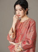 Portrait of the model wearing the jacket, highlighting its neckline and embroidered cuffs