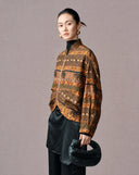 Side view of the relaxed vintage brown mulberry silk satin jacket with elephant motifs