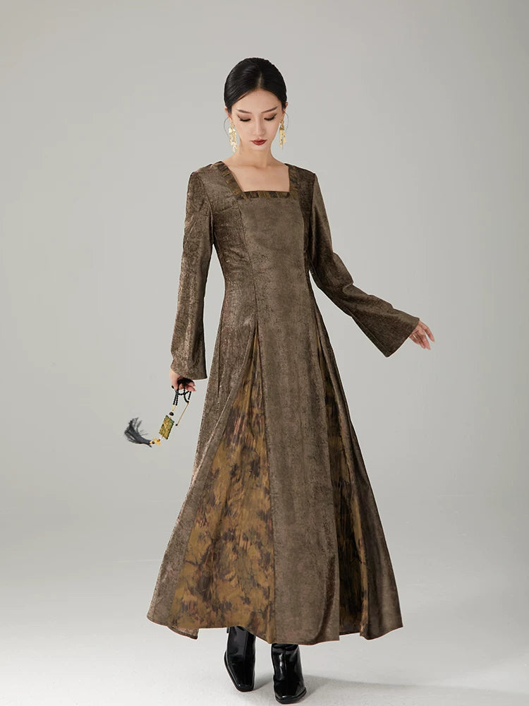 Close-up of the vintage jacquard maxi dress highlighting its textured fabric and flowing silhouette.