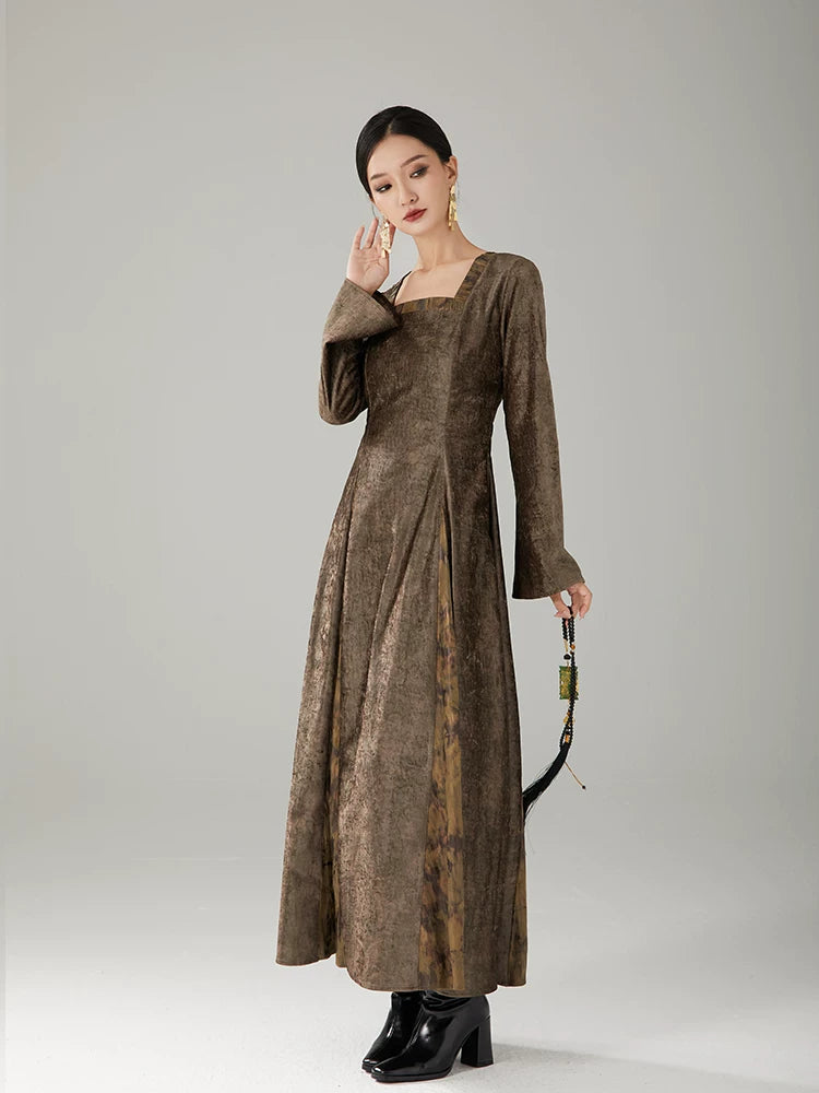 Women's elegant vintage maxi dress featuring a square neckline and softly flared sleeves.