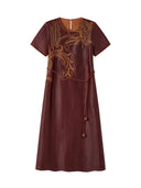 Front product view of the wine-red Hongyunsha silk dress with botanical embroidery and a waist tie