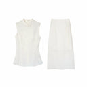 Flat lay of a white New Chinese style two-piece set, featuring a sleeveless top with a mandarin collar and a matching midi skirt.
