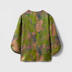 Back view of the loose-fit green and bronze floral Xiangyunsha silk blouse