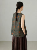 Back view of grey Xiangyunsha mulberry silk sleeveless vest showcasing elegant drape and traditional textile craftsmanship