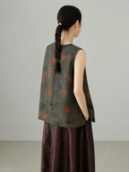 Back view of grey Xiangyunsha mulberry silk sleeveless vest showcasing elegant drape and traditional textile craftsmanship