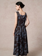 Back view of a brown 100% mulberry silk Xiangyunsha dress with blue floral jacquard, featuring a gathered waist, back zipper, and a flowing A-line skirt.