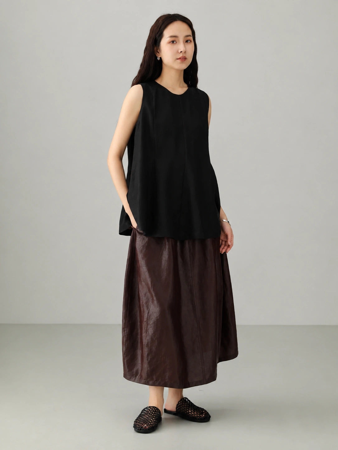 Women's ink black Xiangyunsha mulberry silk sleeveless top featuring elegant drape and relaxed oriental silhouette