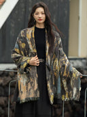 Xuye leather jacket with the cashmere shawl panel spread across the shoulders, showing its abstract pattern and fringed edges